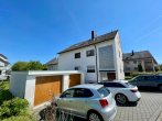 Gepflegtes Dreifamilienhaus in Welzheim zu verkaufen - Außenaufnahme mit Garagen