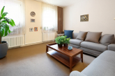 Kapitalanlage mit Charme und Potenzial: Wohnensemble mit Vorder- und Hinterhaus in bevorzugter Lage in Stuttgart - EG: Wohnzimmer
