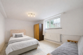 Kapitalanlage! Charmante 2-Zimmer-Souterrain Wohnung in Weissach im Tal - Schlafzimmer