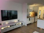 Moderne 3-Zimmer-Wohnung mit Balkon und Terrasse in Weinstadt! - Wohnzimmer TV