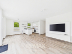 Exklusive 2-Zimmer-Penthousewohnung in Top-Lage mit großer Dachterrasse und Tiefgaragenstellplätzen - Wohn- und Essbereich